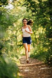 Fotoroleta woman running in the park