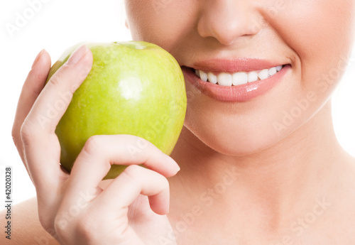 Plakat Kobieta z zielonym jabłkiem