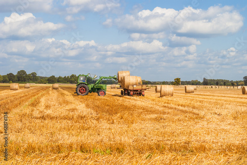 Obraz na płótnie traktor maszyna pszenica