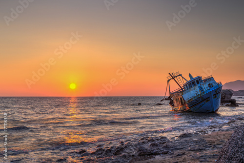 Naklejka plaża grecja wybrzeże łódź morze