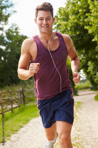 Fotoroleta portret park muzyka wieś fitness