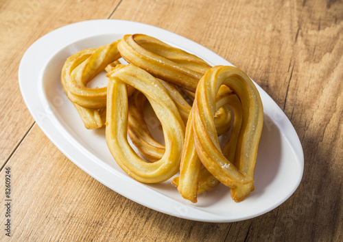 Fotoroleta churros delikatny gastronomia słodki