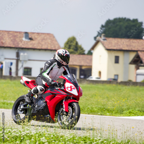 Plakat sport wyścig motocyklista