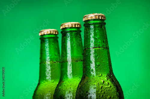 Plakat Three wet blank beer bottles