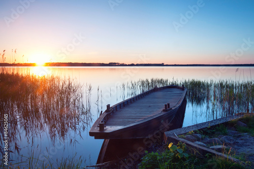 Plakat plaża brzeg zmierzch niebo