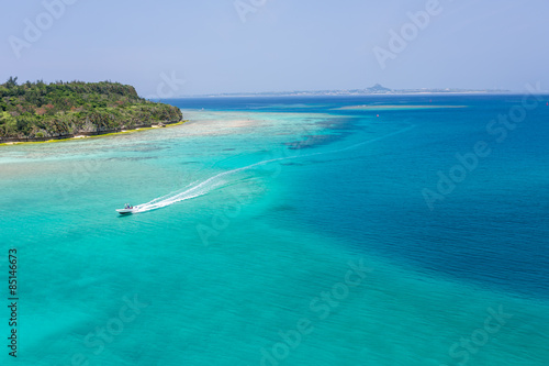 Fototapeta wyspa niebo kobieta plaża morze