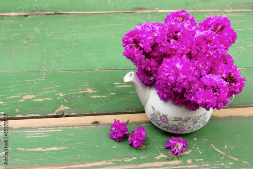 Plakat flower bouquet on wooden planks