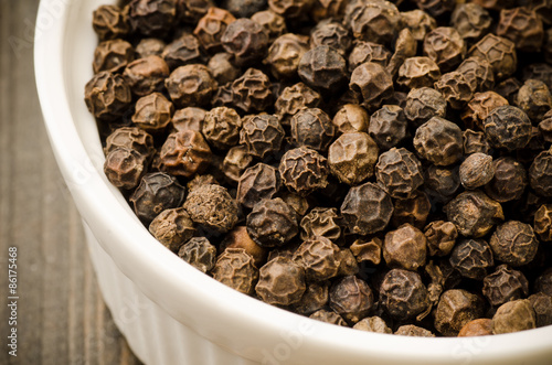 Fotoroleta Black pepper in the white bowl,food seasoning