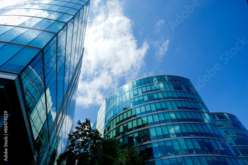 Fototapeta Office building and reflection in London, England, background